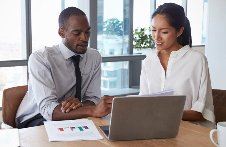 man and woman discussing finances